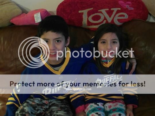 wearing their Buffalo Sabres hockey jersey shirts wearing their Buffalo Sabres hockey jersey shirts